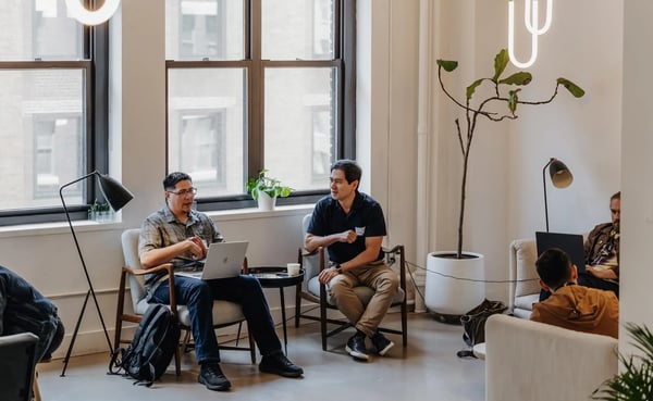 Team collaborating in a Blender Workspace meeting room