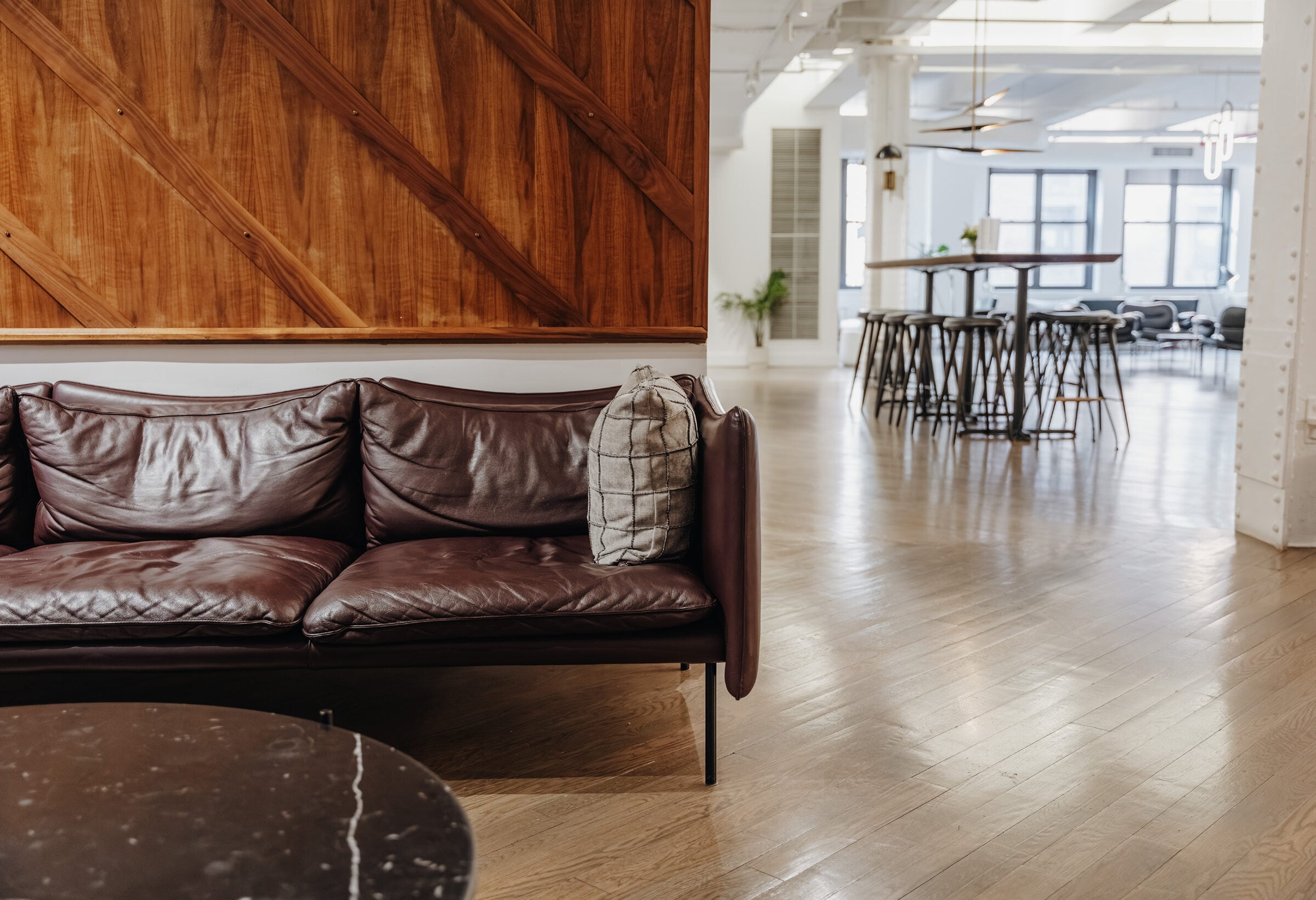 Lounge seating with leather sofa and marble table